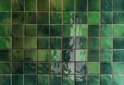Green ceramic tile background. Old vintage ceramic tiles in green to decorate Stock Photos