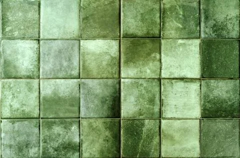 Green ceramic tile background. Old vintage ceramic tiles in green to decorate Stock Photos