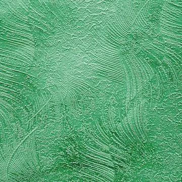 Green ceramic tile with floral pattern for wall and floor decor. Concrete stone Stock Photos