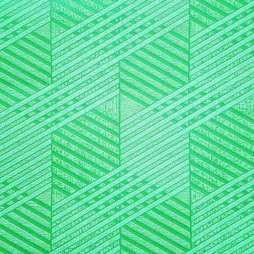 Green ceramic tile with geometric pattern for wall and floor decoration Stock Photos