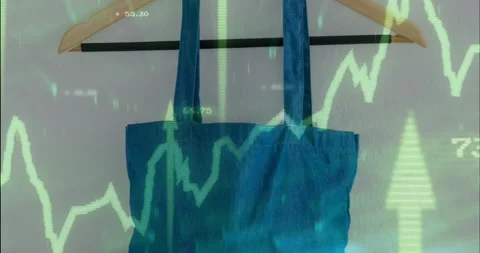 Green chart appearing from left, animating jagged line over teal tote bag, Stock Footage 328345354
