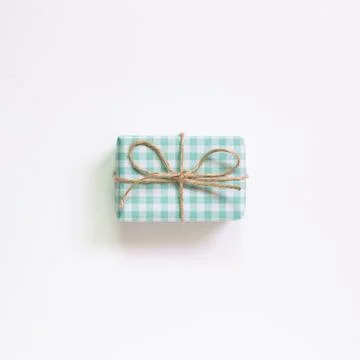 Green check pattern gift box isolated on white background Foto stock