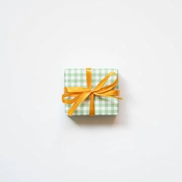 Green check pattern gift box isolated on white background. top view Green ... Stock Photos