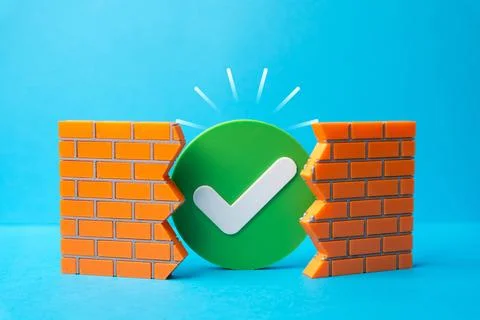 A green checkmark in a gap in the wall. Break through barriers and obstacles. Stock Photos