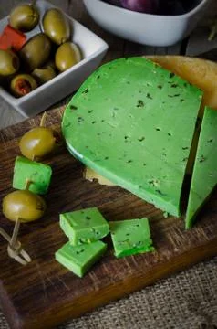 Green cheese with basil. Stock Photos