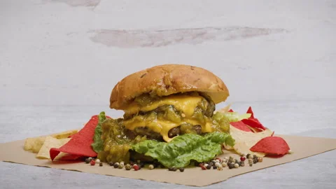 Green Chile Oozing from a Gourmet Cheeseburger Stock Footage 141019584