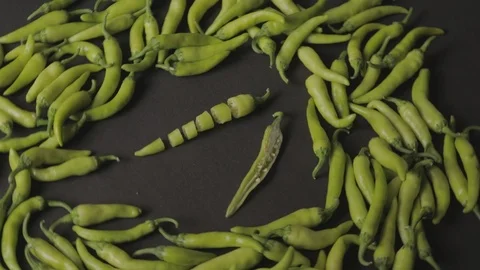 Green chilli isolated on blue background Stock Footage 110842800