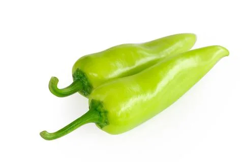 Green chilli pepper on white background, raw food ingredient concept Stock Photos