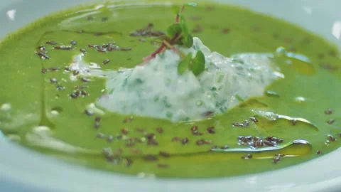 Green chowder from spinach and spices Stock Footage 197309741