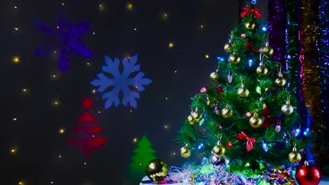 Green Christmas tree on the background of flying animation Stock Footage 144570079