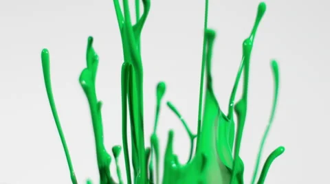 Green chroma key paint splashes isolated on white in slow motion Stock Footage 63994688