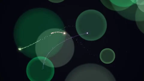 Green circles and trails of dots on a black background Stock Footage 331647898