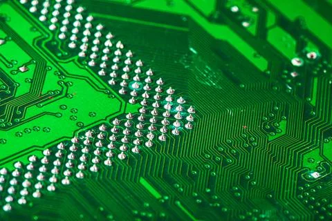 Green circuit board of a computer close up Stock Photos