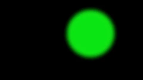 Green circular blurred reveal moving left over black background Vídeos de archivo 331767784