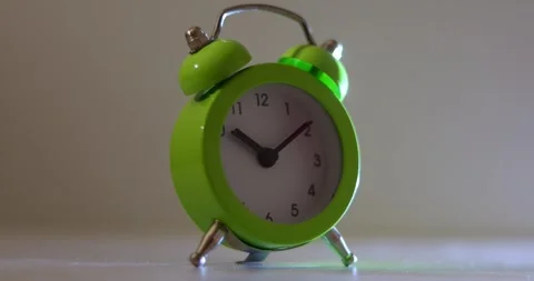 Green The clock sets the time to 10.00. on white background 4k. Stock-Footage 300364517