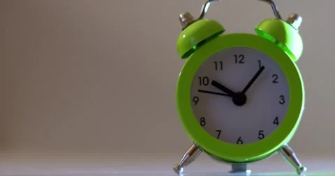 Green The clock sets the time to 10.00. on white background 4k. Stock-Footage 300364538