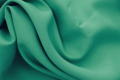 Green cloth texture background Фото