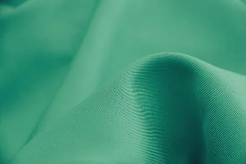 Green cloth texture background Stock-Fotos