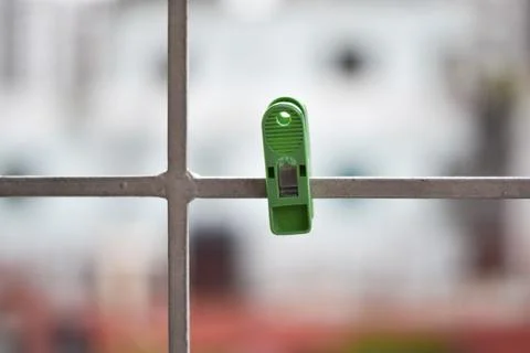 Green clothes-pin on a string Foto stock
