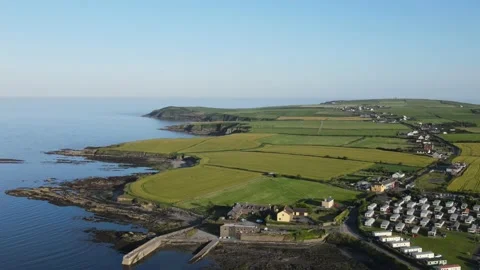 Green coastal Ireland, field patchwork, campsite, road and ocean views. An Video stock 157483201