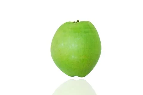 Green coconut on the white background . Stock Photos