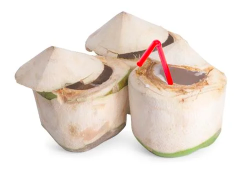 Green coconuts with drinking straw isolated on white background Stock Photos