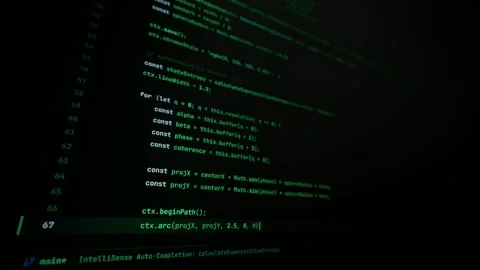 Green Code Lines Displaying on Computer Monitor in Tech Studio Close-Up Stock Footage 347519381