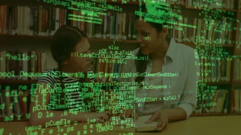 Green code overlay appearing as tutor guiding student reading at library desk 動画素材 312280623