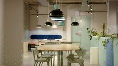 Green code overlay drifting across table and chairs, triggered by data feed Stock Footage 330141870