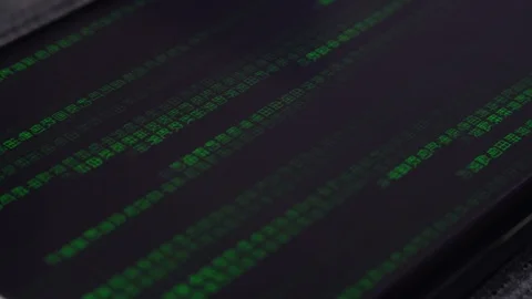 Green code rain on a smartphone screen Stock Footage 114855479
