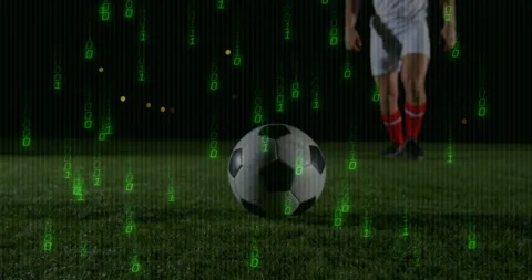 With green code streaming emerging, male athlete kicking soccer ball while Stock Footage 316339166