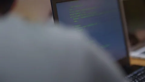 Green Codes Displayed on Computer Screen Stock Footage 99471437