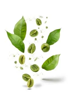 Green coffee beans explosion Stock Photos