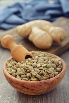 Green coffee beans with ginger Stock Photos