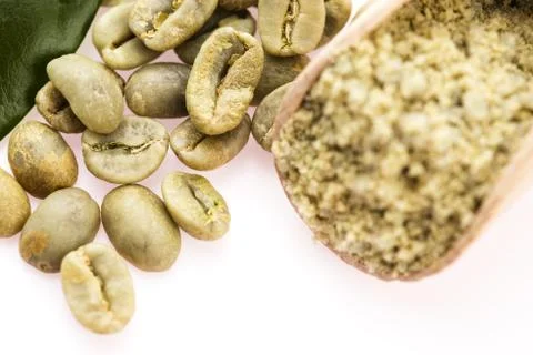 Green coffee beans with leaf Stock Photos