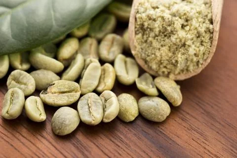 Green coffee beans with leaf Stock-Fotos