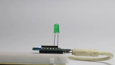 Green color light emitting diode is blinking Stock Footage 327978408