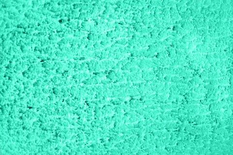 Green colored house front, structured with spatula techniques. Stock Photos