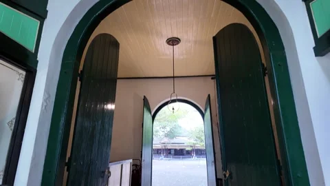 Green colored large gate inside Keraton Yogyakarta Stock Footage 291669619