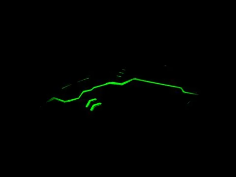 Green colored light running over rgb computer gaming mouse Stock Photos