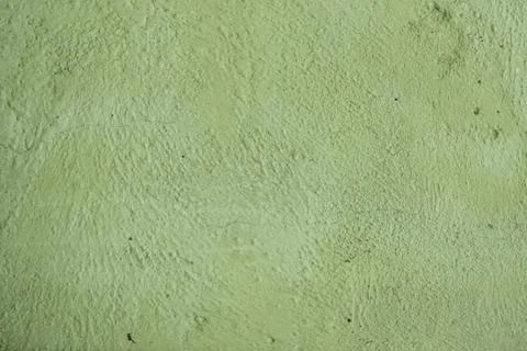 A green colored old wall texture background. Stock Photos