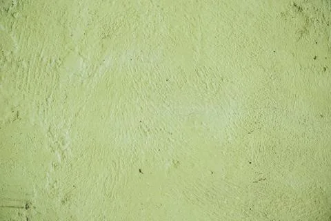 A green colored old wall texture background. Stock Photos