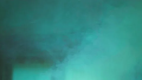 Green colored smoke, highlighting the use of a smoke machine for filming and cre Stock Footage 281577450