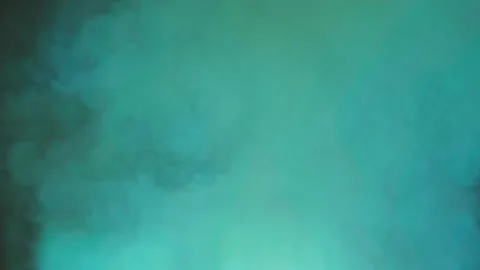 Green colored smoke, highlighting the use of a smoke machine for filming and cre Stock Footage 281577716