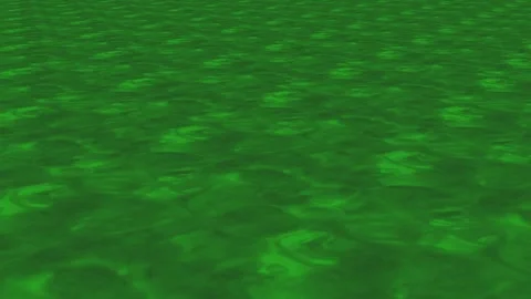 A green colored water with ripples on the surface Vídeos de archivo 330910846