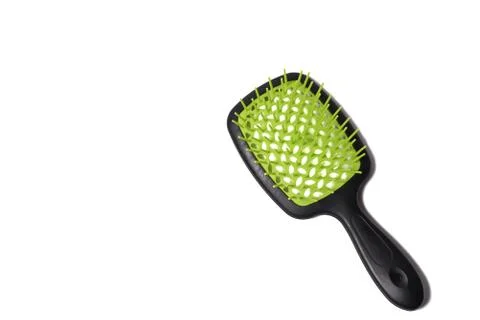 Green comb on white background Stock Photos
