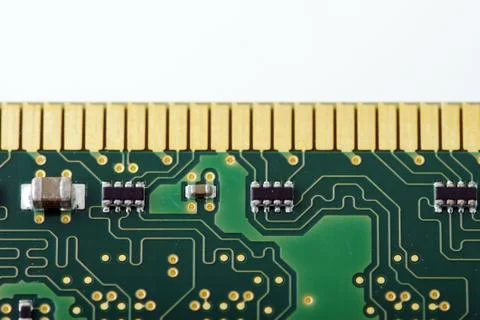 Green computer board with chips and components. Stock Photos