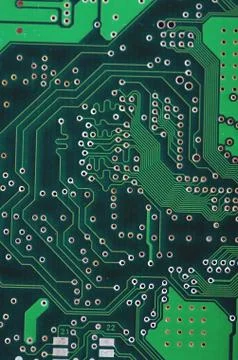 Green computer board with chips and components. Foto stock