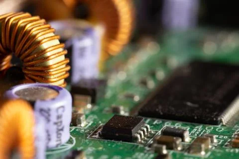 Green computer board with different electronics elements. texture Stock Photos