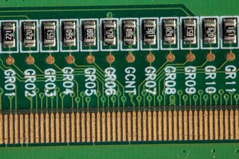 Green computer board with different electronics elements. texture Stock Photos
